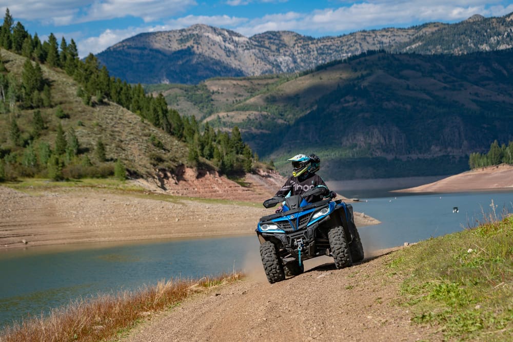 trail riding on a CFMoto CForce ATV